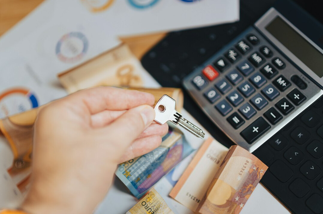 person calculating loan payments