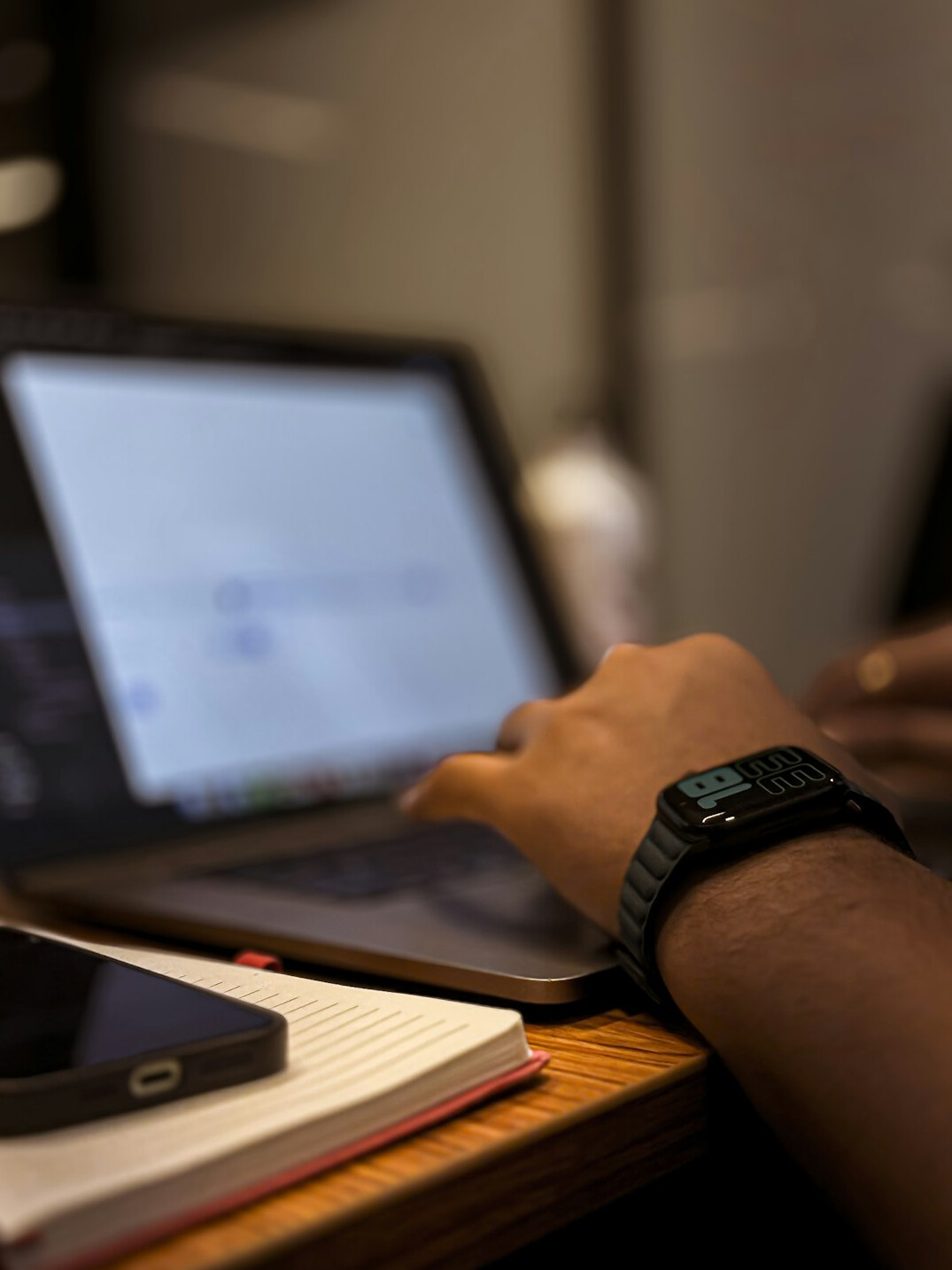 person calculating finances on laptop