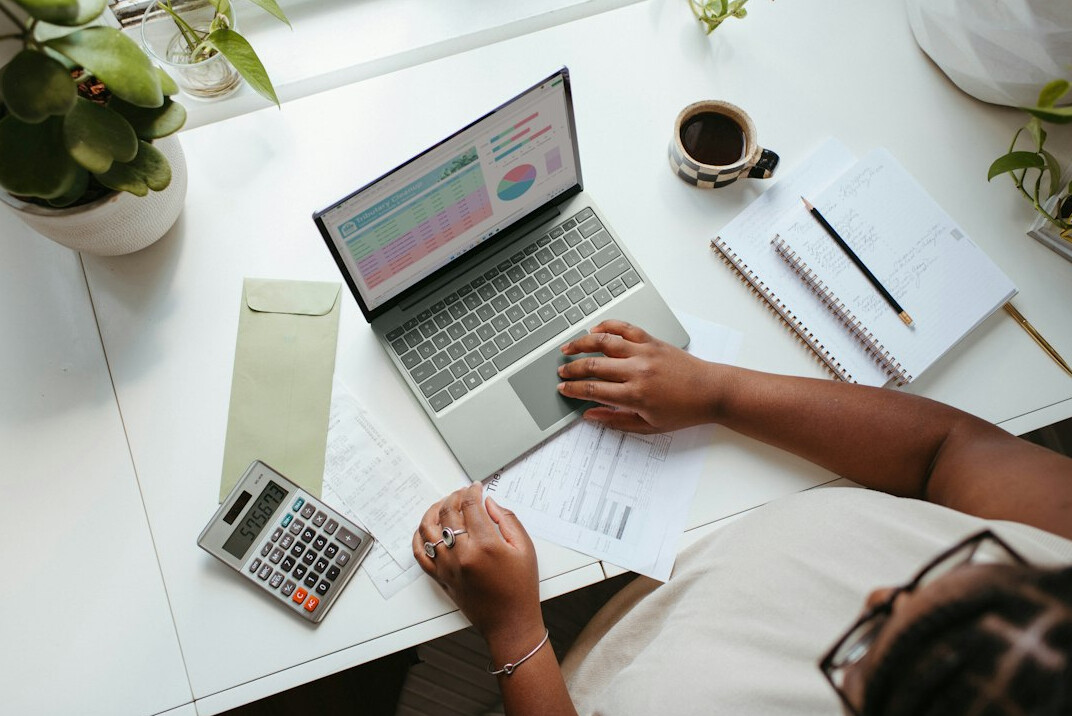 person reviewing monthly expenses